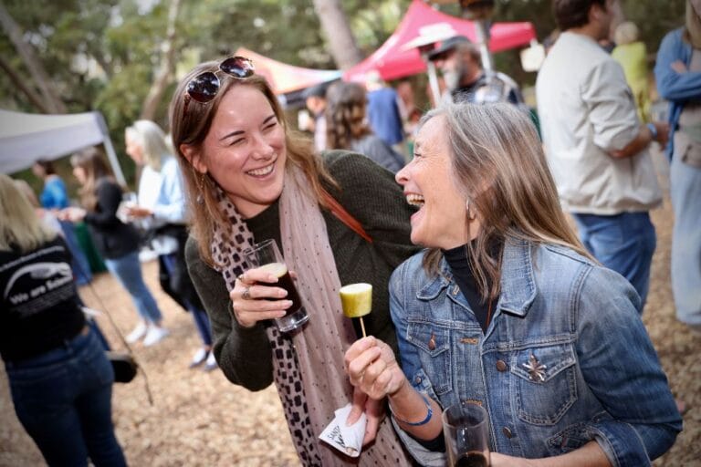 Enjoying-a-stout-and-salty-snack-from-Santa-Barbaras-own-Pacific-Pickle-Works-at-the-Mission-Creek-Beer-Festival-2024.-Photo-by-Baron-Spafford